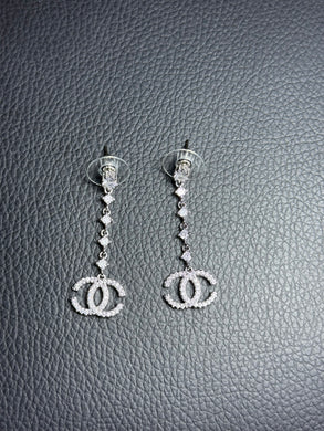 Boucle d’oreille inoxydable